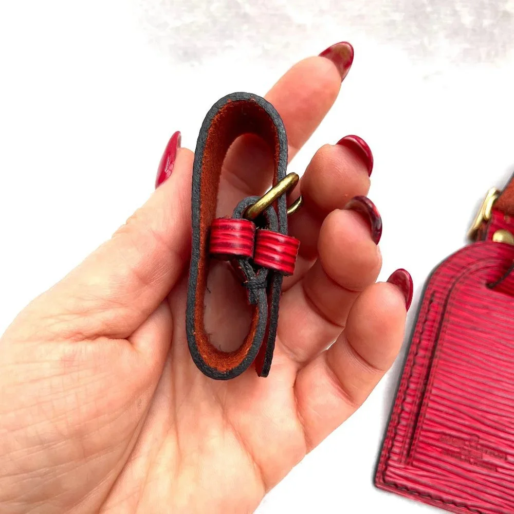 Rare Louis Vuitton red Epi leather luggage tag and poignet set